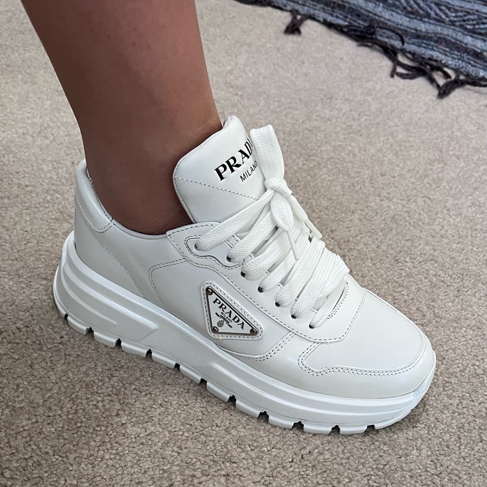 White Brand New Authentic Prada Sneakers women’s size 35. Cute tennis shoes!